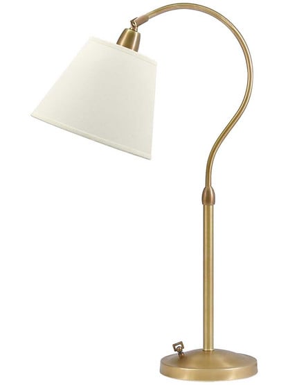 Hyde Park Table Lamp with Off-White Linen Shade in Weathered Brass.